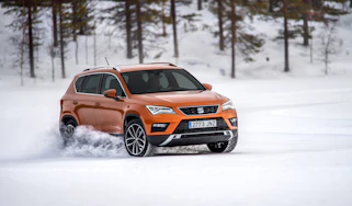 SEAT Ateca snow front three-quarters