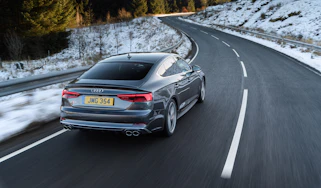Audi S5 Sportback rear three quarters tracking