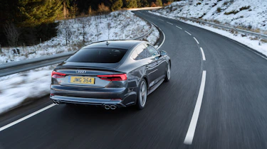 Audi S5 Sportback rear three quarters tracking