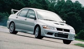 Mitsubishi Lancer Evolution VII - press shot yellow