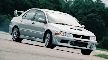 Mitsubishi Lancer Evolution VII - press shot yellow