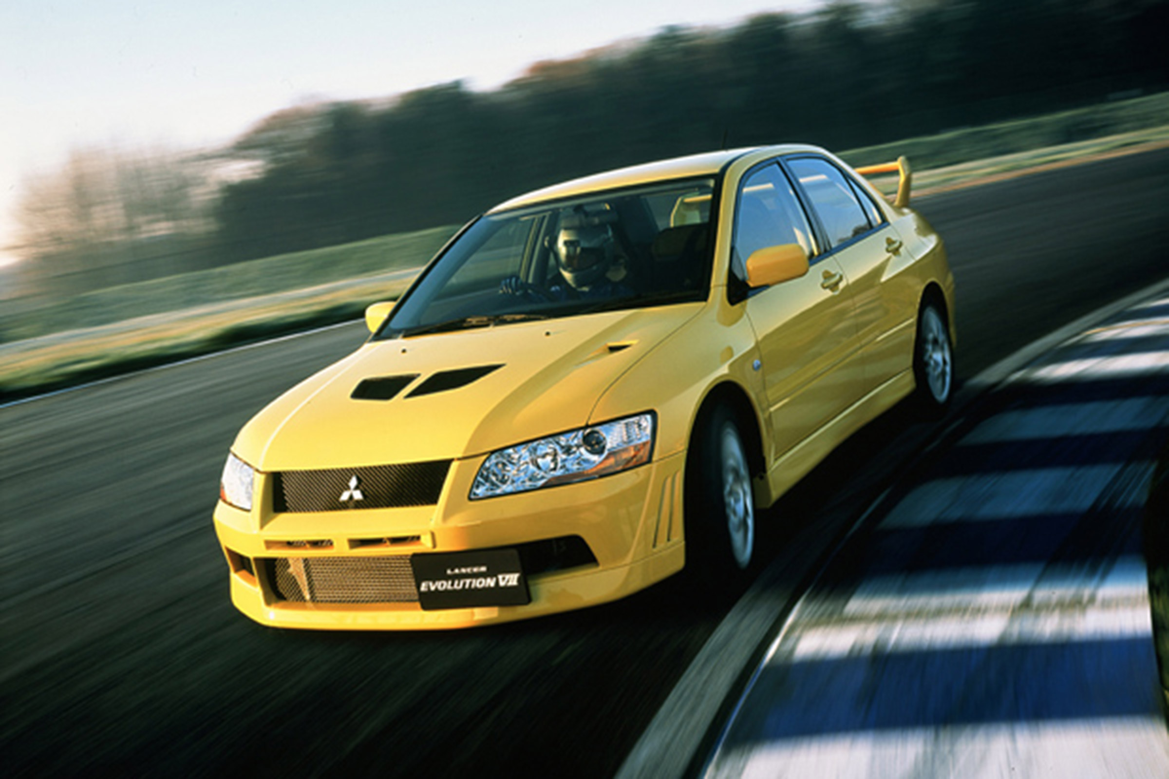 Mitsubishi Lancer Evolution VII - yellow