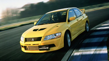 Mitsubishi Lancer Evolution VII - yellow