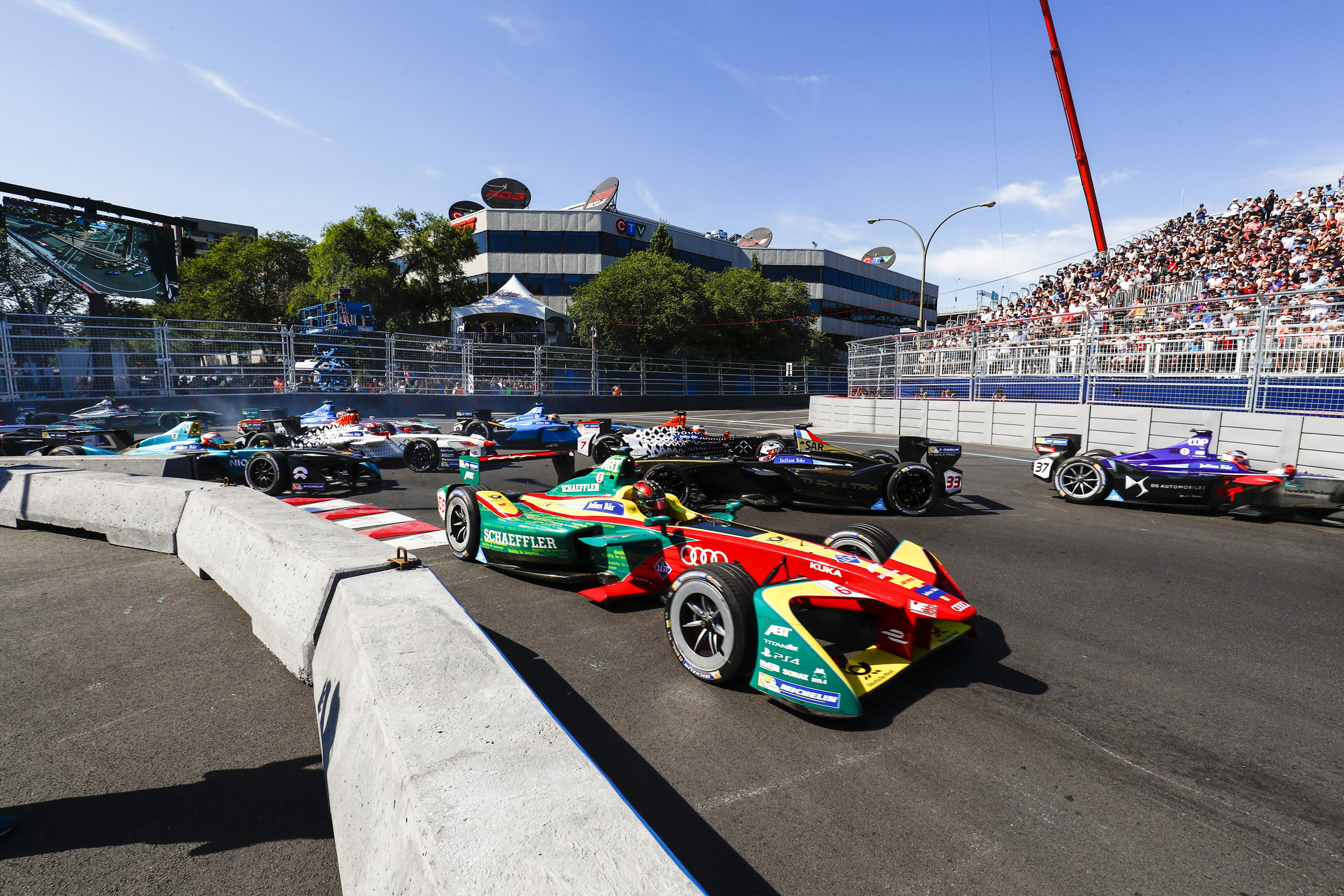 Drivers pick their way through the first lap chaos in Canada