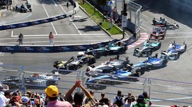 Sebastien Buemi gets held up in the melee at the first corner