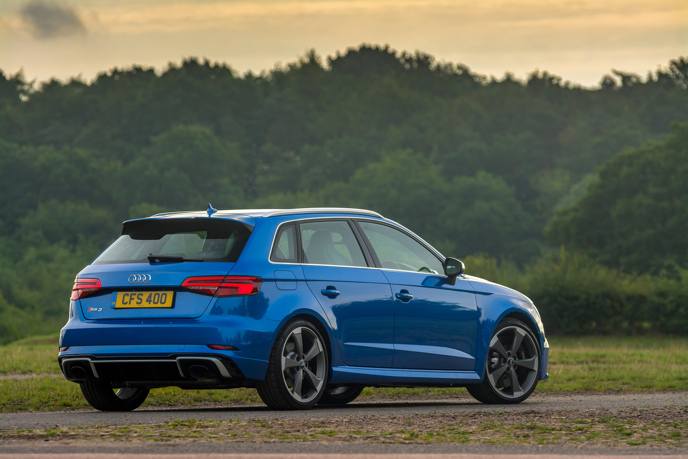 Audi RS3 hatch (facelift) UK press blue - rear 3/4 static