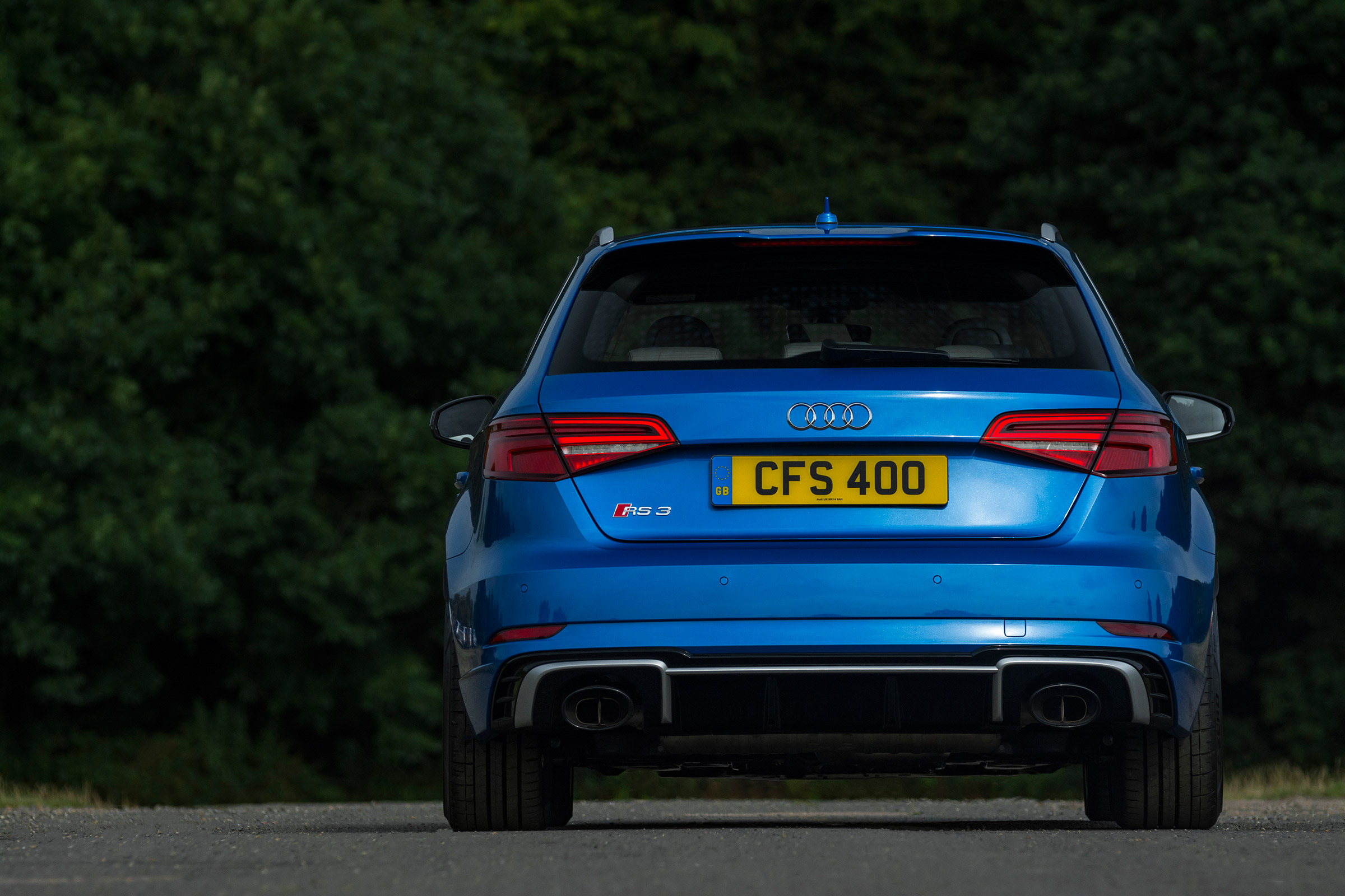 Audi RS3 hatch (facelift) UK press blue - rear static