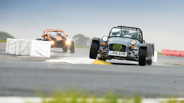 Ariel Atom and Caterham on track.