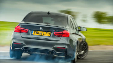 BMW M3 Competition Package –rear on track