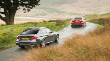 BMW M3 Competition Package & Alfa Romeo Giulia Quadrifoglio – rear on road