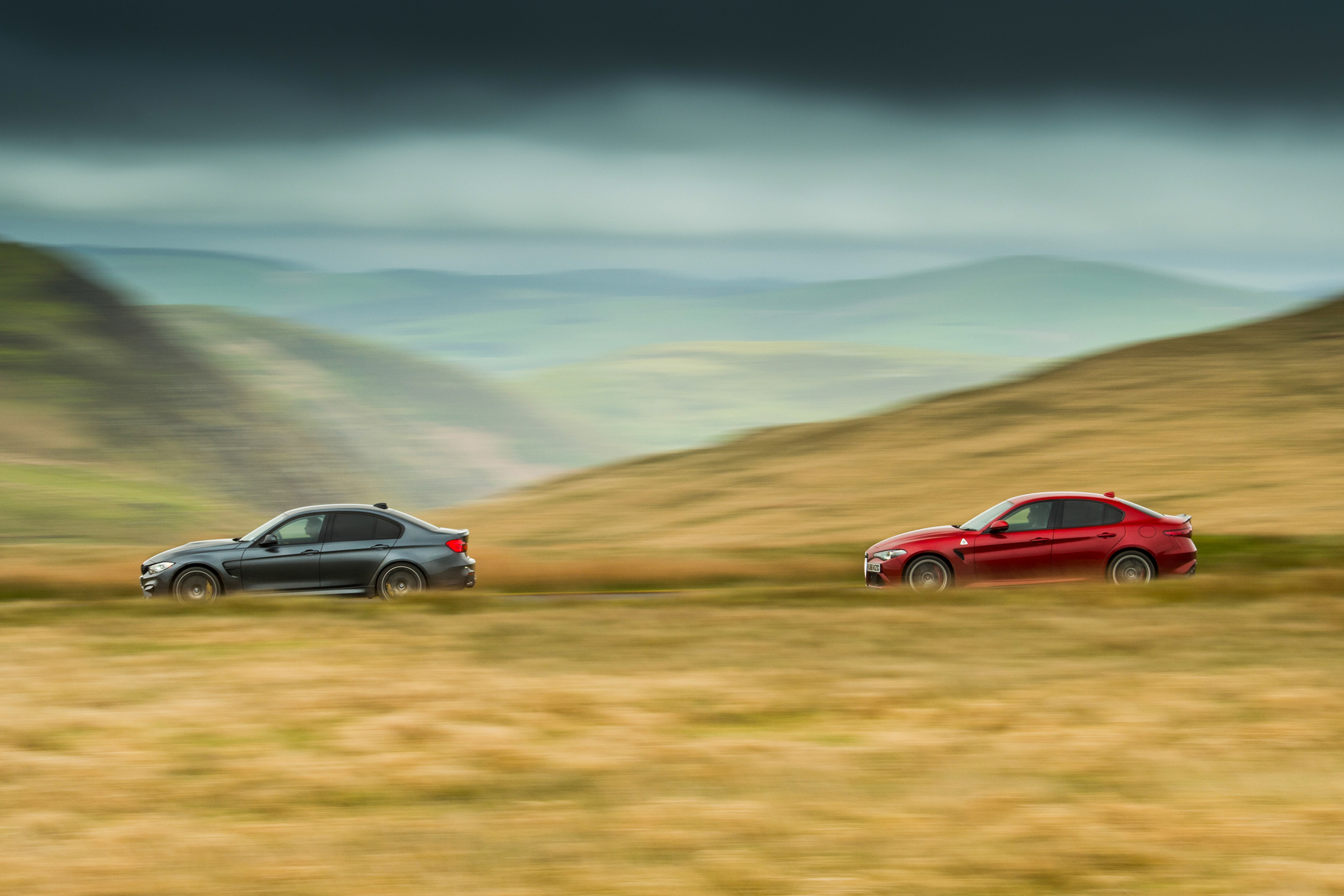 BMW M3 Competition Package &amp; Alfa Romeo Giulia Quadrifoglio – side on road
