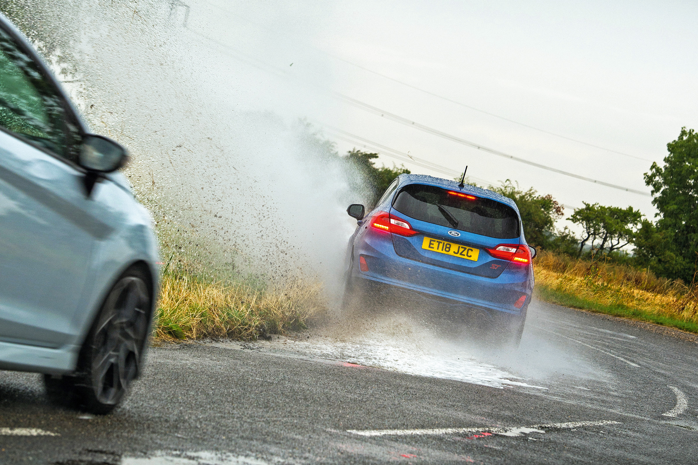 New Ford Fiesta ST vs hot hatch greats