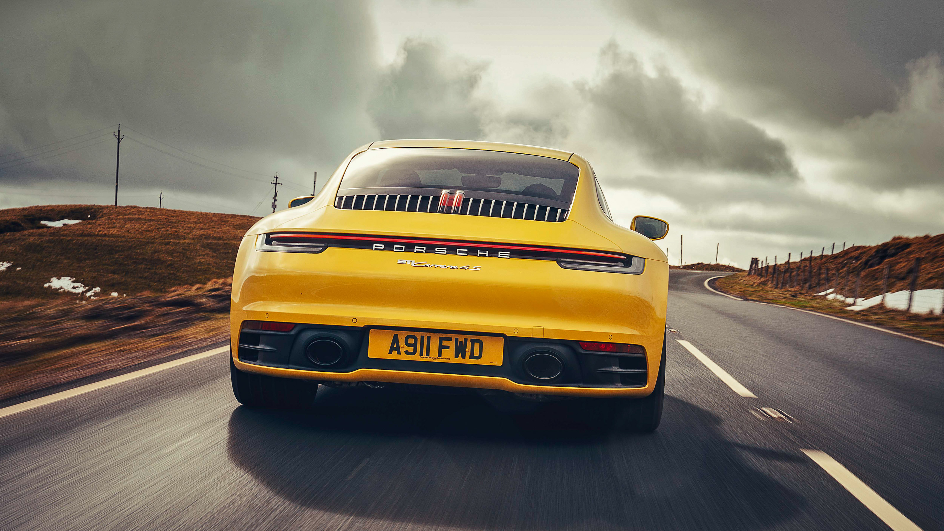 Porsche 911 Carrera 4S road rear