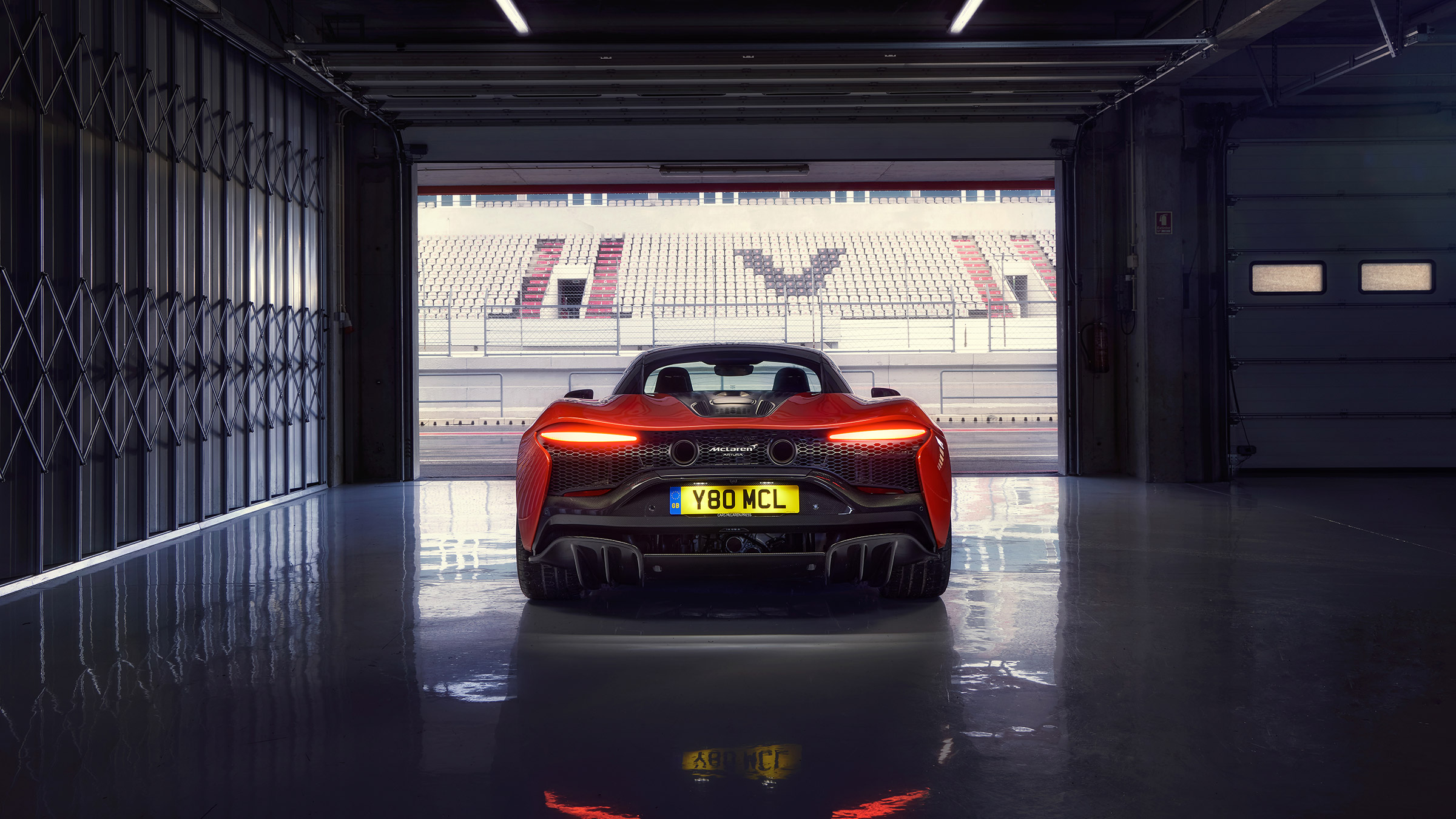 McLaren Artura revealed - orange garage rear