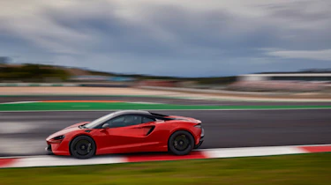 McLaren Artura revealed - orange cornering