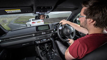 BMW M2 Competition vs Toyota GR Supra - interior driving