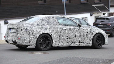 2022 BMW M2 spied road rear quarter