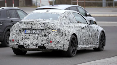2022 BMW M2 spied road rear quarter