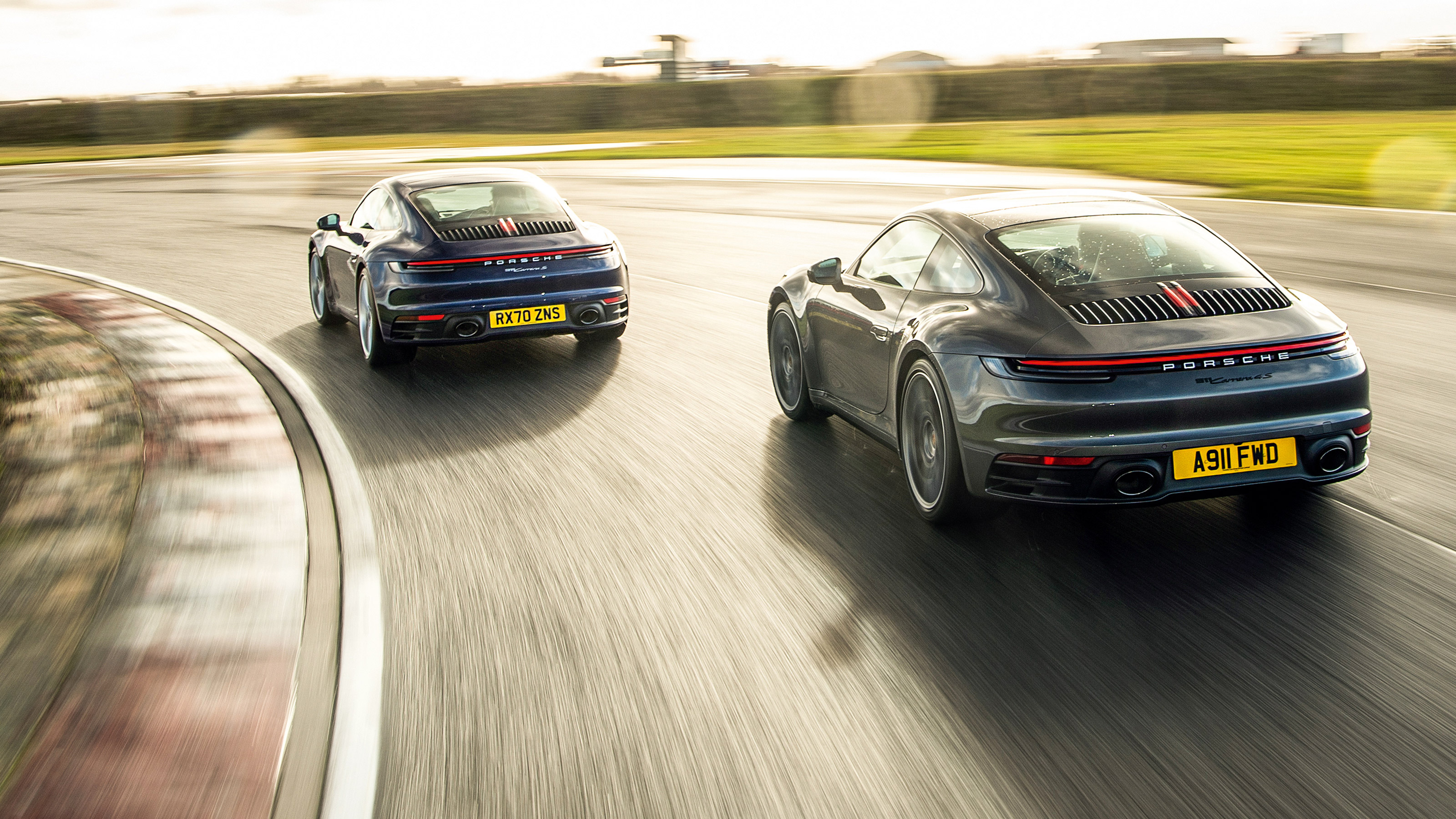 Porsche 911 and BMW M2 CS manual v auto