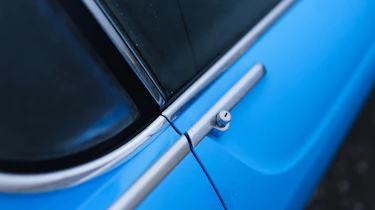 Volvo P1800 Cyan Racing – door handle
