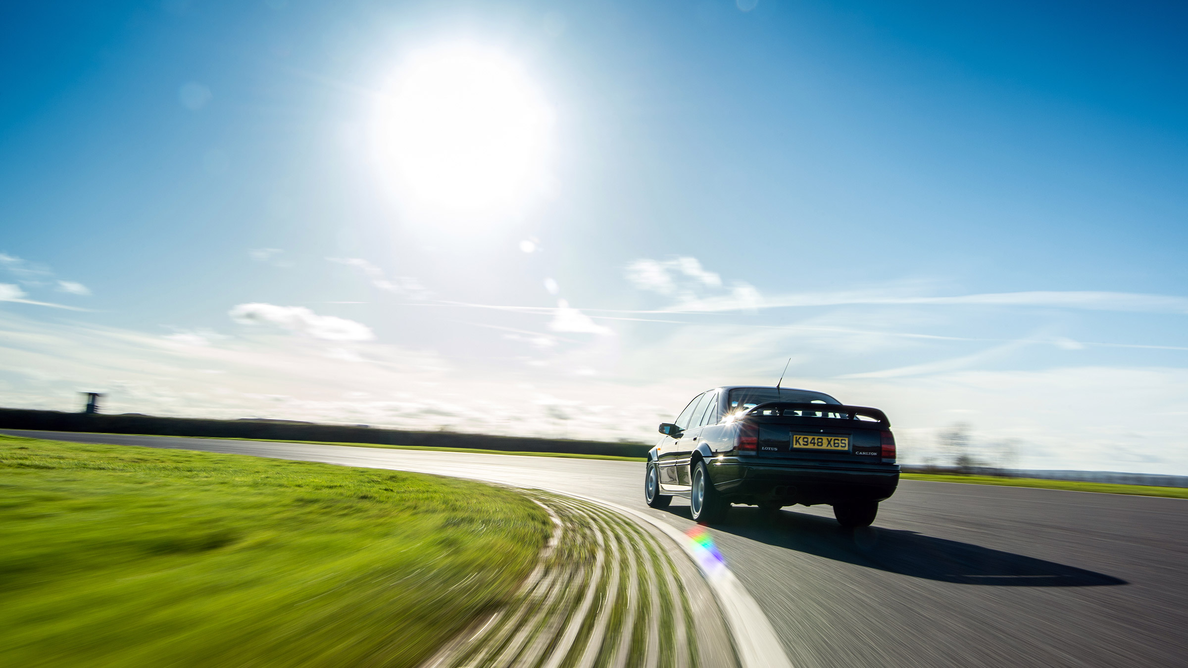 Lotus Carlton evo Icon – rear cornering 1