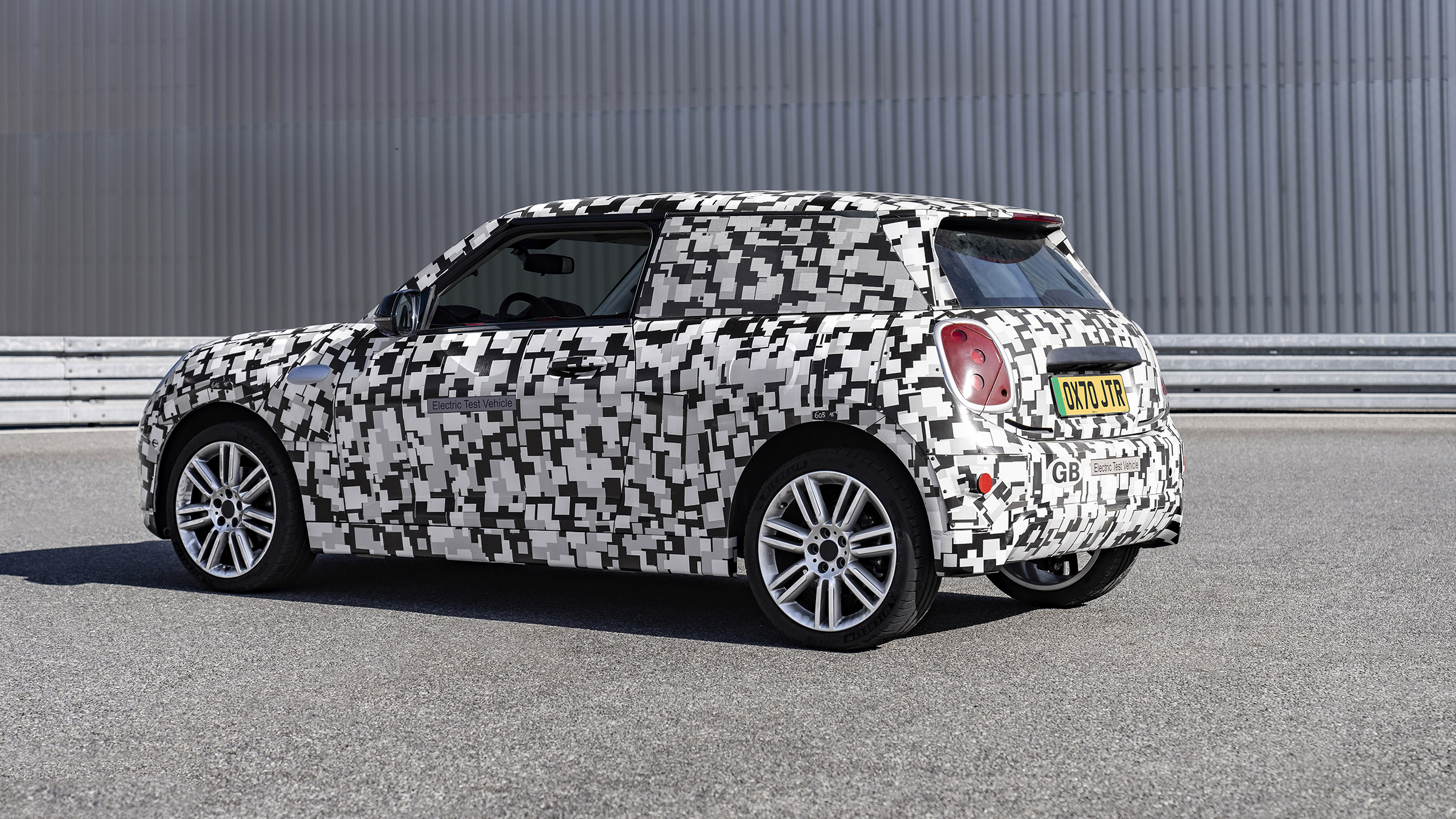 new Mini EV three-door rear quarter
