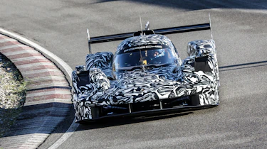 Porsche LMDh racer – cornering