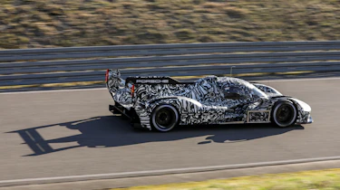 Porsche LMDh racer – rear quarter