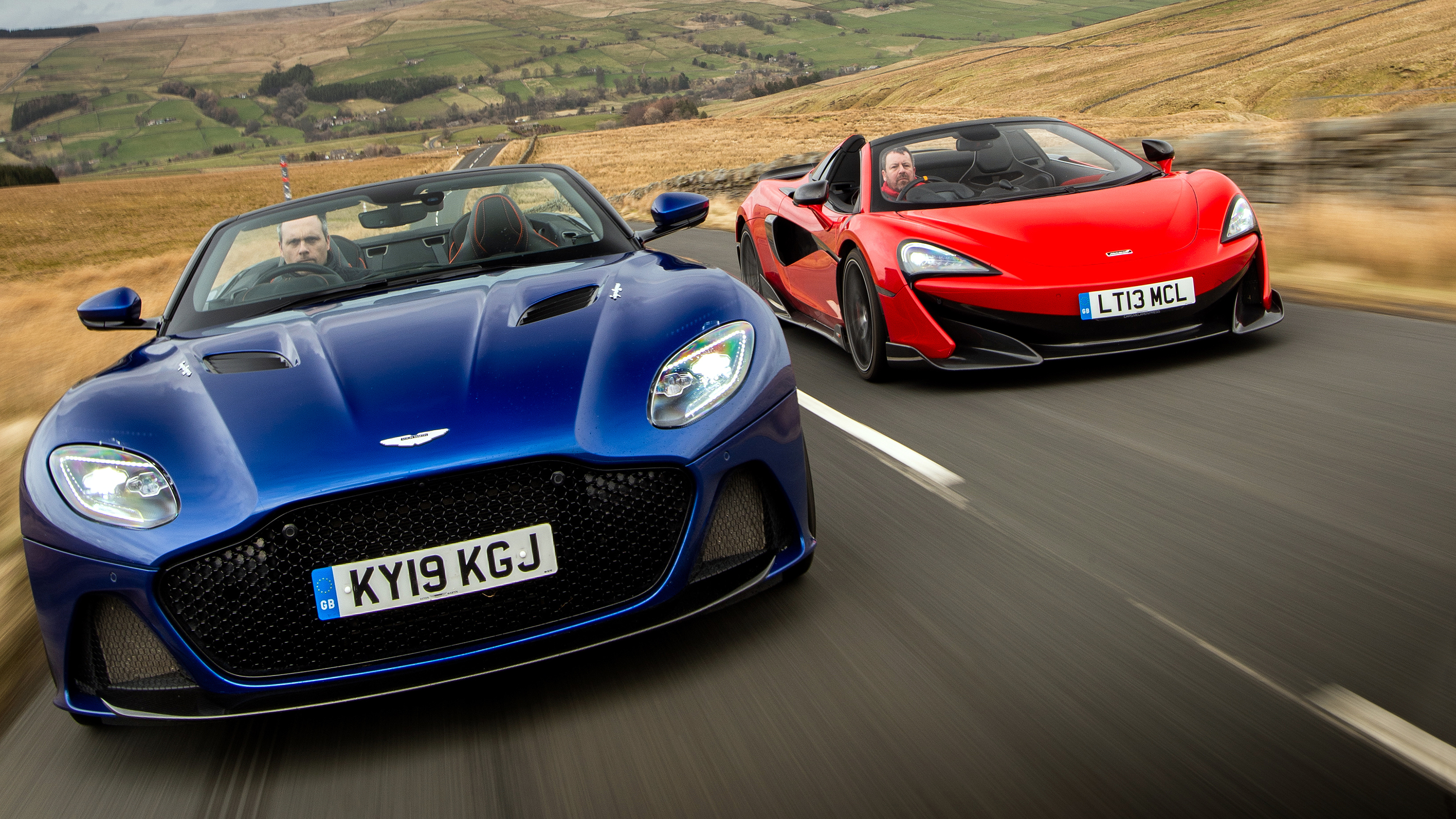 Aston Martin DBS leading McLaren 600LT