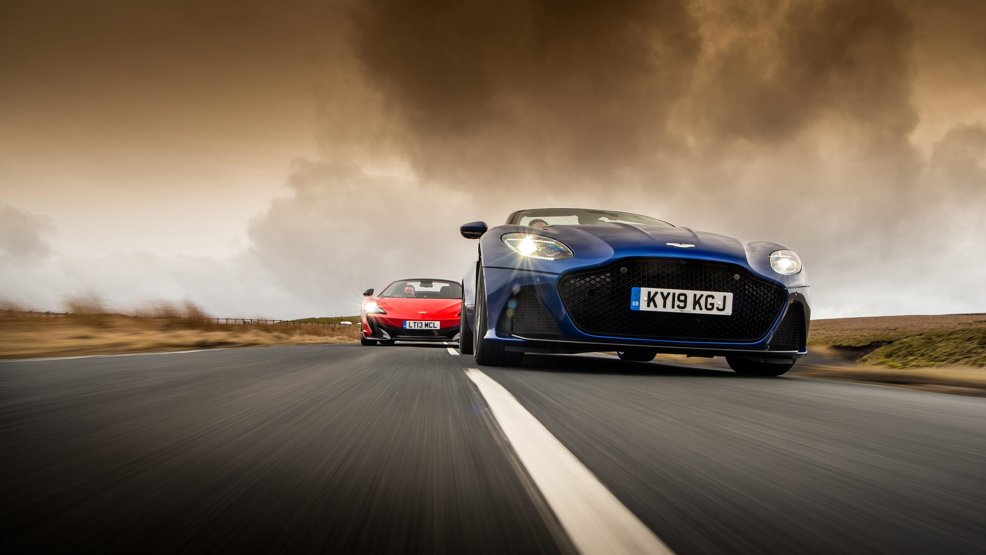 Aston Martin DBS leading McLaren 600LT