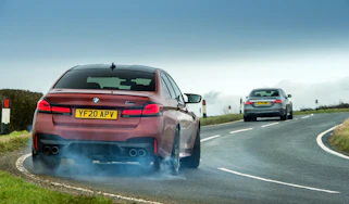 Mercedes-AMG E63S v BMW M5 Competition – header