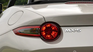 MX5 header