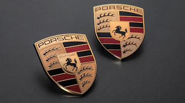 Old and new Porsche logos
