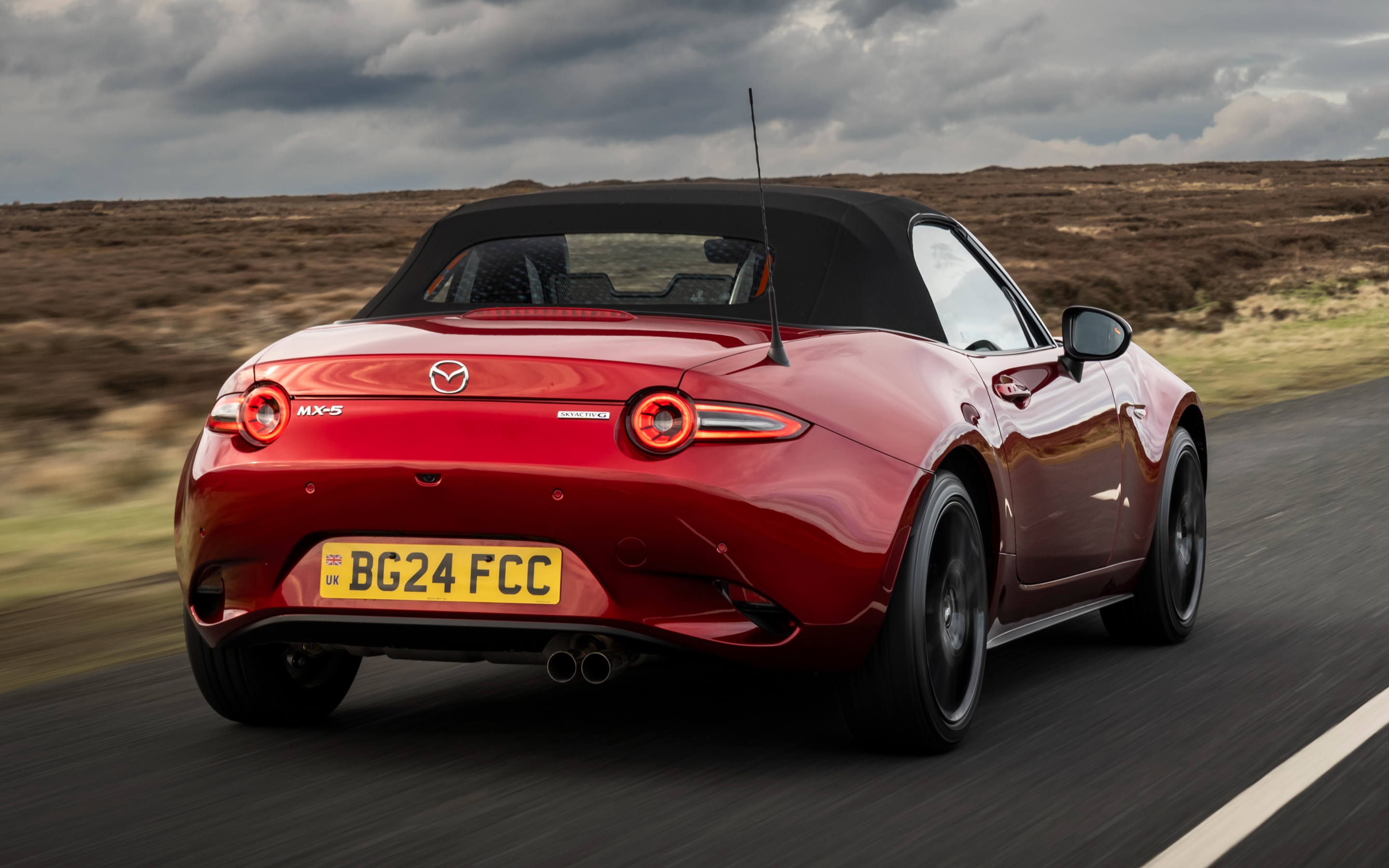 2025 Mazda MX-5 driving rear