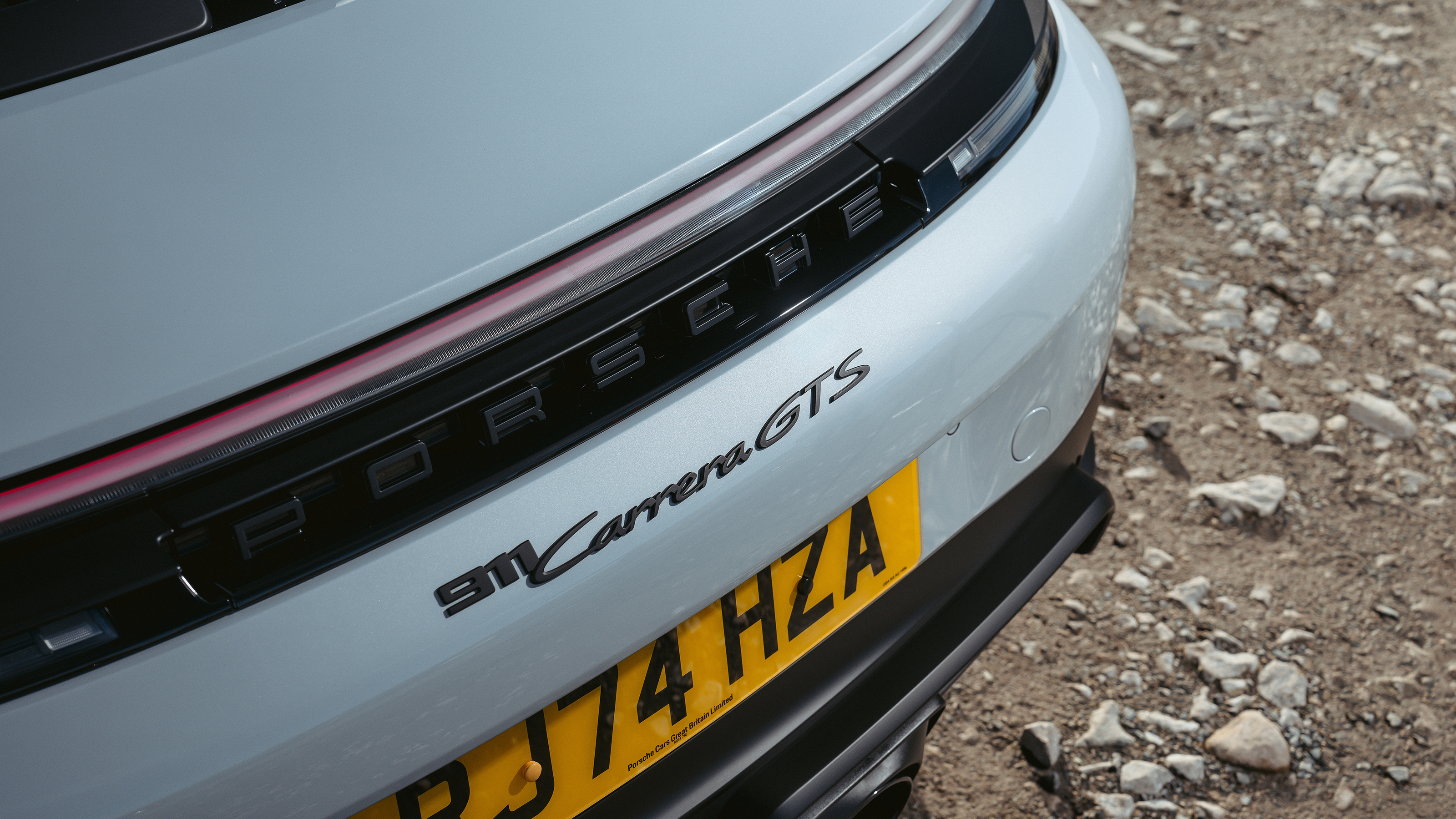 Porsche 911 Carrera GTS T-Hybrid – badge