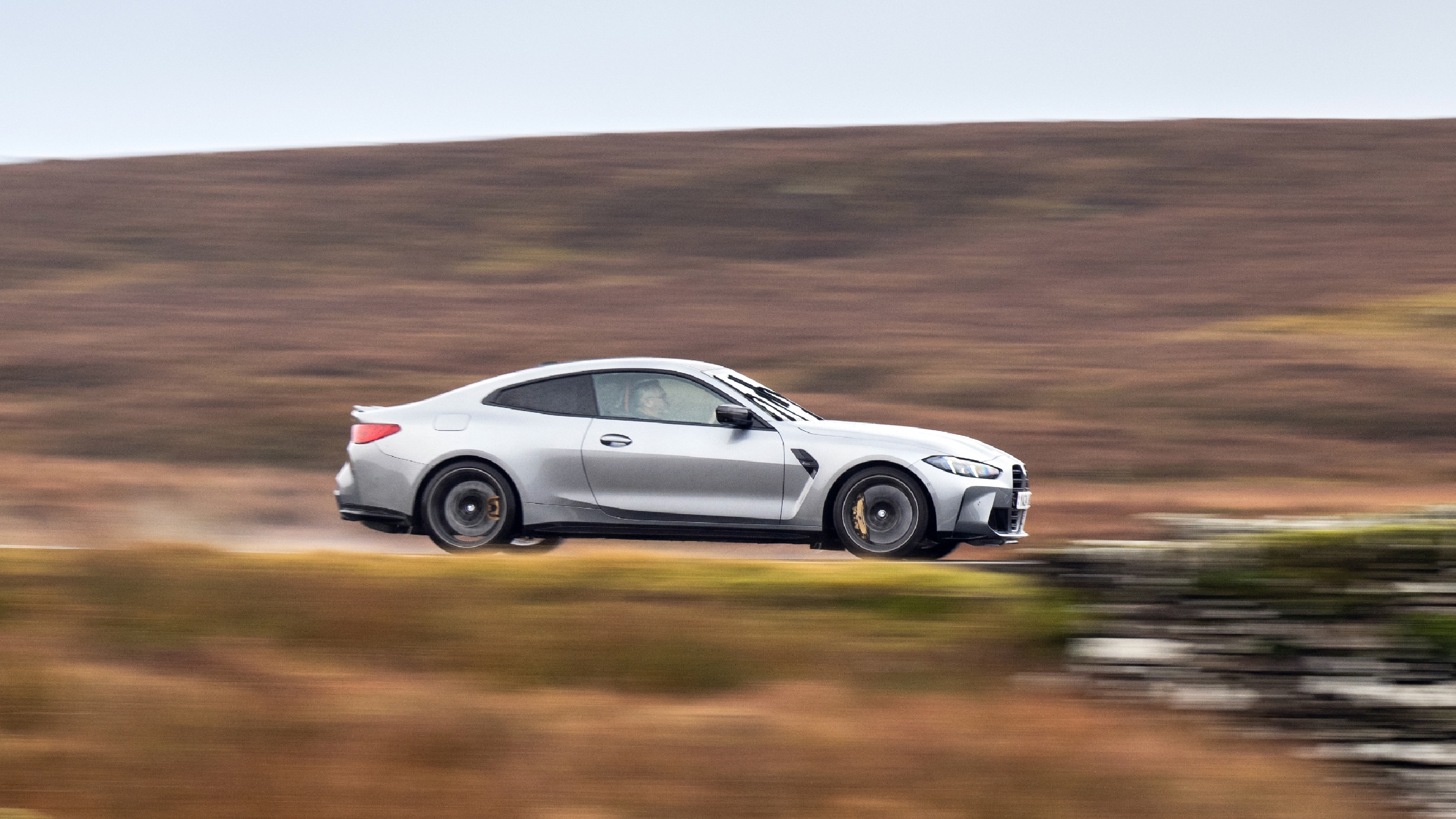 BMW M4 v Porsche 911 side