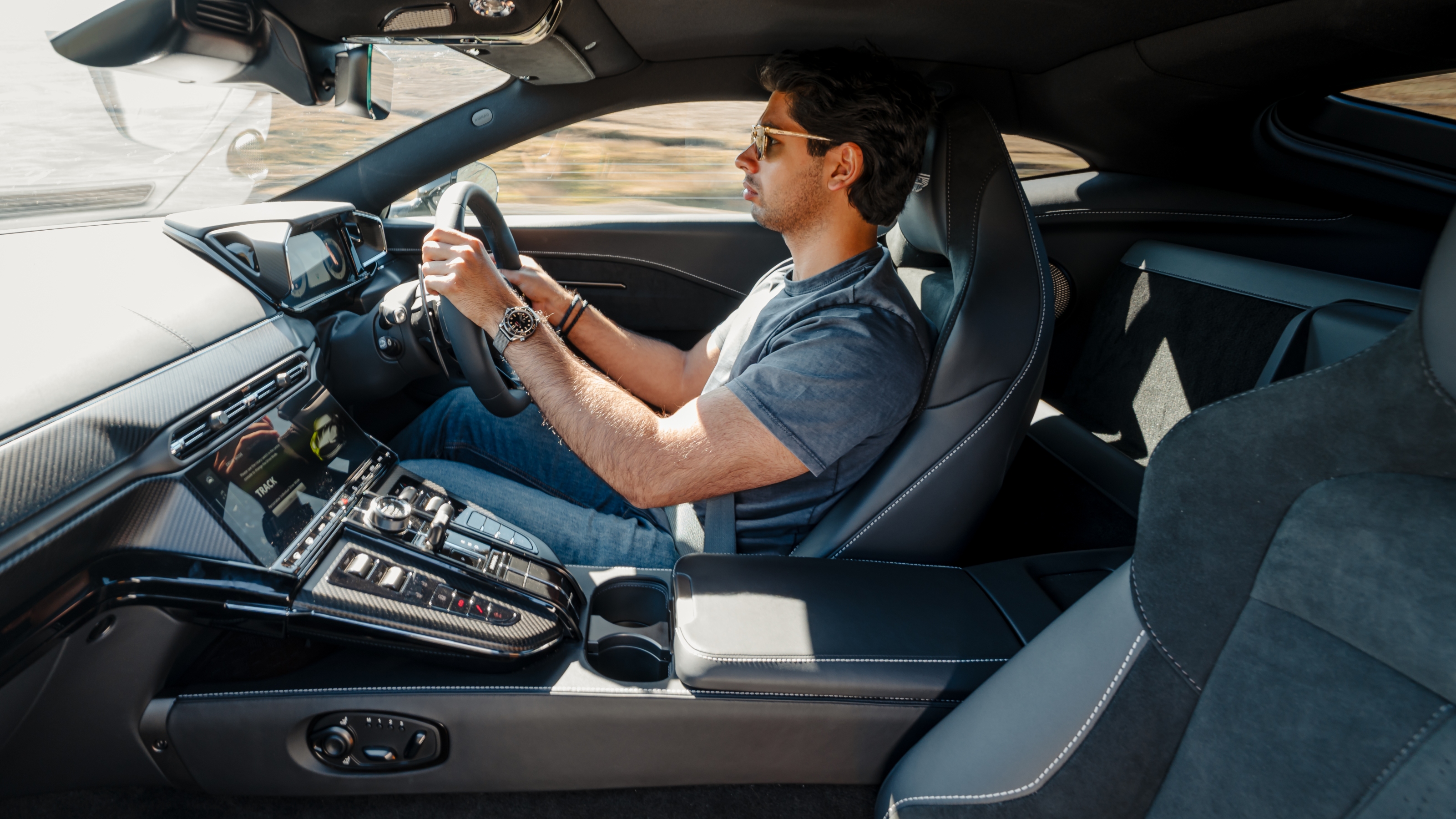 Aston Martin Vantage interior driving