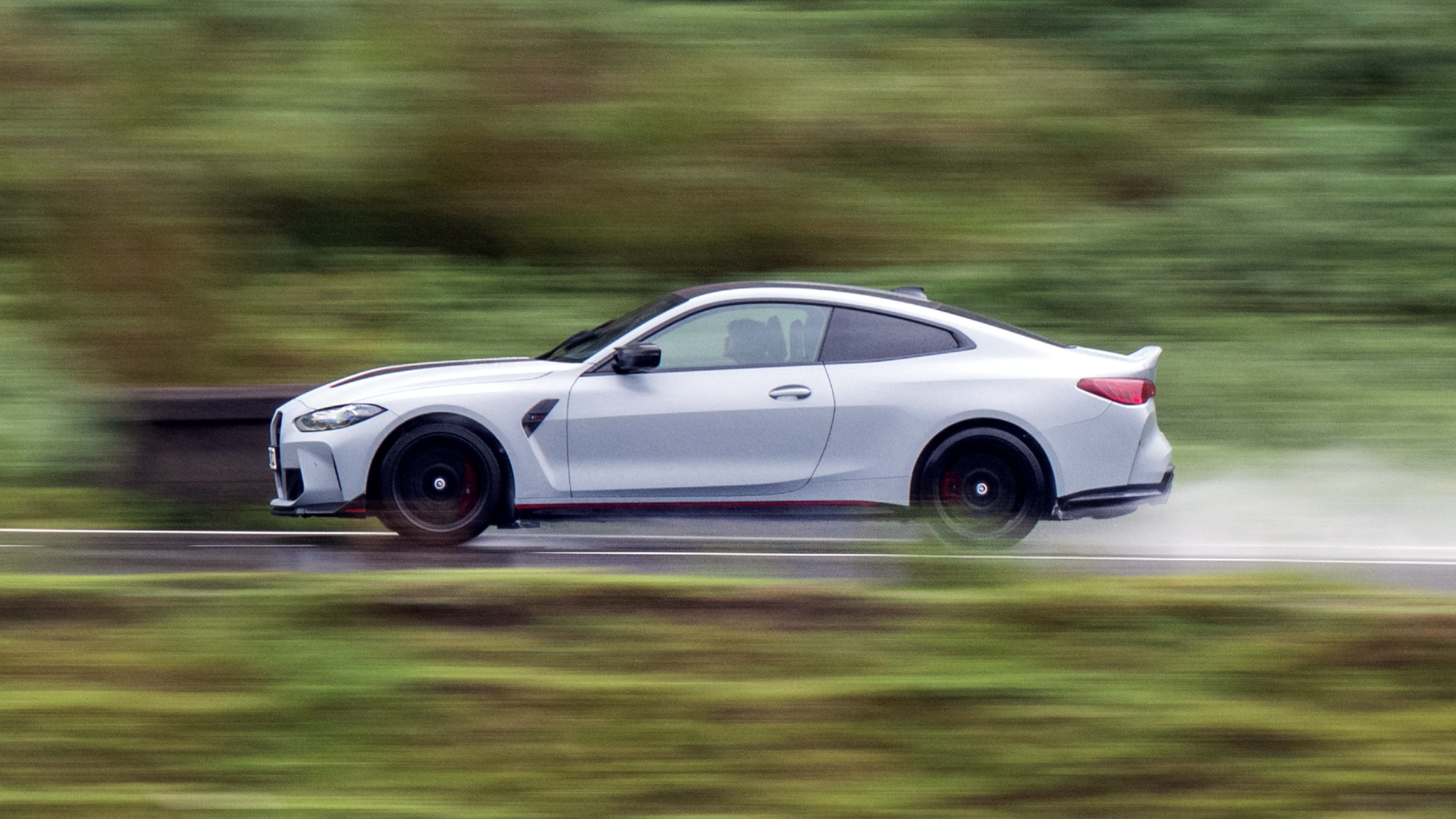 BMW M4 CSL side driving