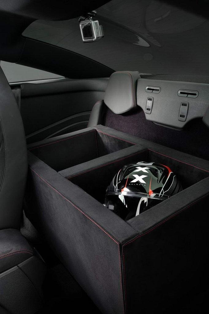 A leather wrapped box is mounted in the rear for helmets