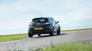 Our black test car sits on Öhlins dampers