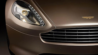 Aston Martin Dragon 88 grille gold badge