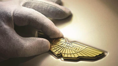 Aston Martin Dragon 88 gold badge