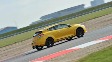 Yellow Renaultsport Megane 265 Trophy on track at Bedford