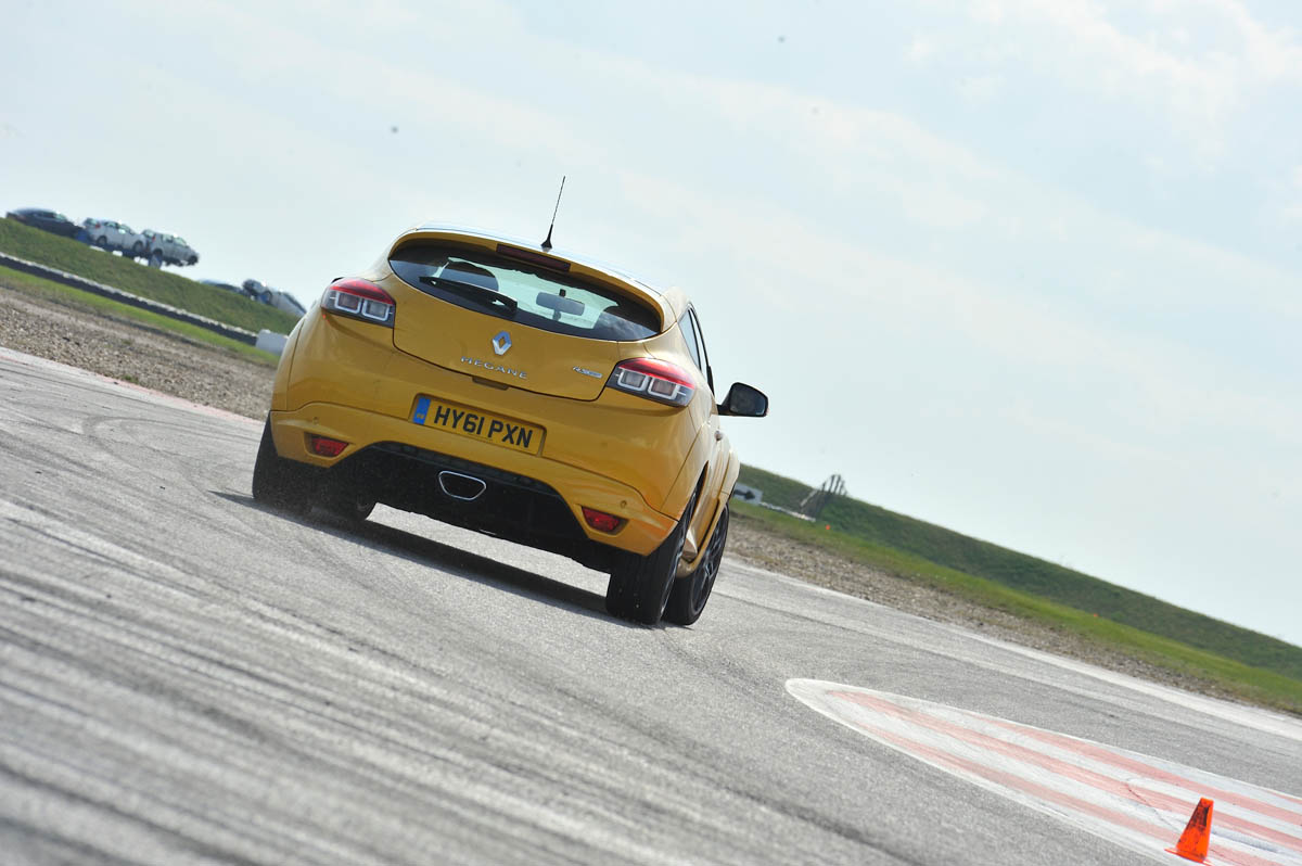 Yellow Renaultsport Megane 265 Trophy on track at Bedford