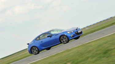 Blue Subaru BRZ coupe on track at Bedford