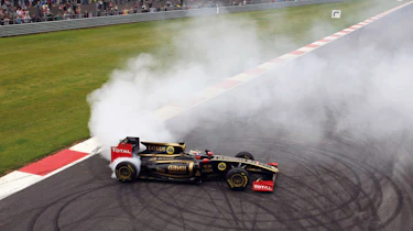Lotus F1 car doing a burnout