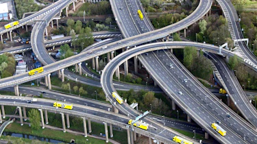 Dunlop Motorsport has celebrated the milestone with an impressive ten-truck drive-by stunt.