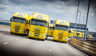Dunlop Motorsport has celebrated the milestone with an impressive ten-truck drive-by stunt.