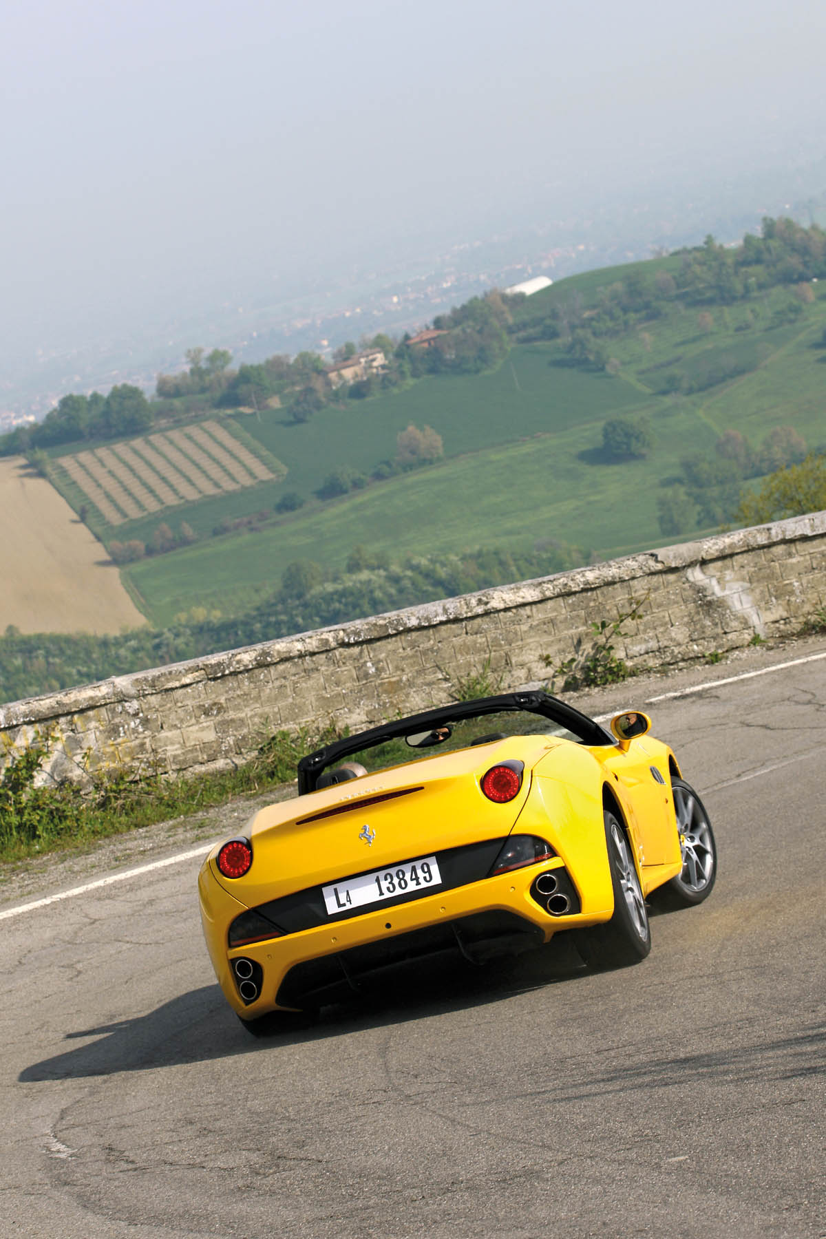2012 Ferrari California yellow roof down