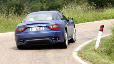 2012 Maserati GranTurismo Sport rear cornering